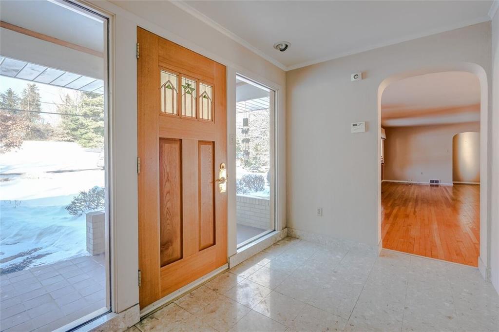 210 Crestmont Road Pittsburgh, PA 15237 - Photo 2 of 24 You will enjoy greeting guests in this charming foyer with lots of light and custom made entry door.