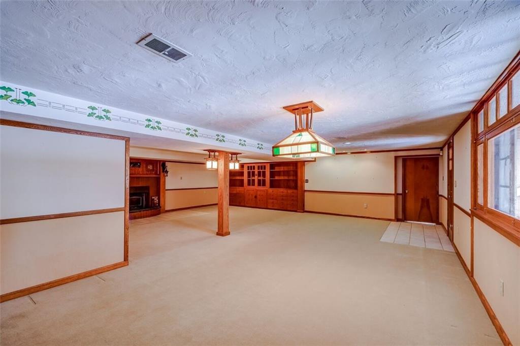 210 Crestmont Road Pittsburgh, PA 15237 - Photo 14 of 24 So much space to relax in the finished lower level game room!
