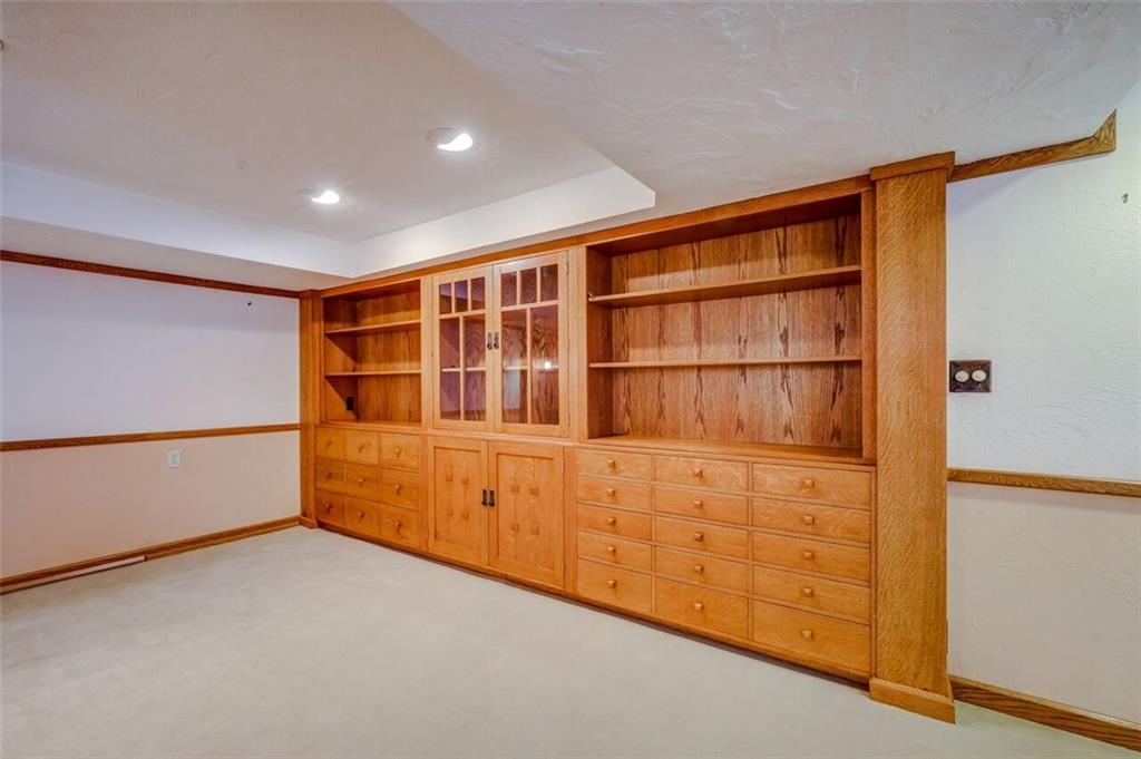 210 Crestmont Road Pittsburgh, PA 15237 - Photo 16 of 24 This wall of built in cabinetry adds so much charm and functionality to the game room.
