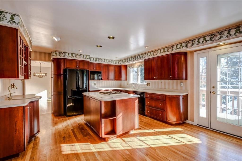 210 Crestmont Road Pittsburgh, PA 15237 - Photo 6 of 24 The chef of the home will enjoy cooking in this cherry kitchen with hardwood floors, center island and room for a table too ~