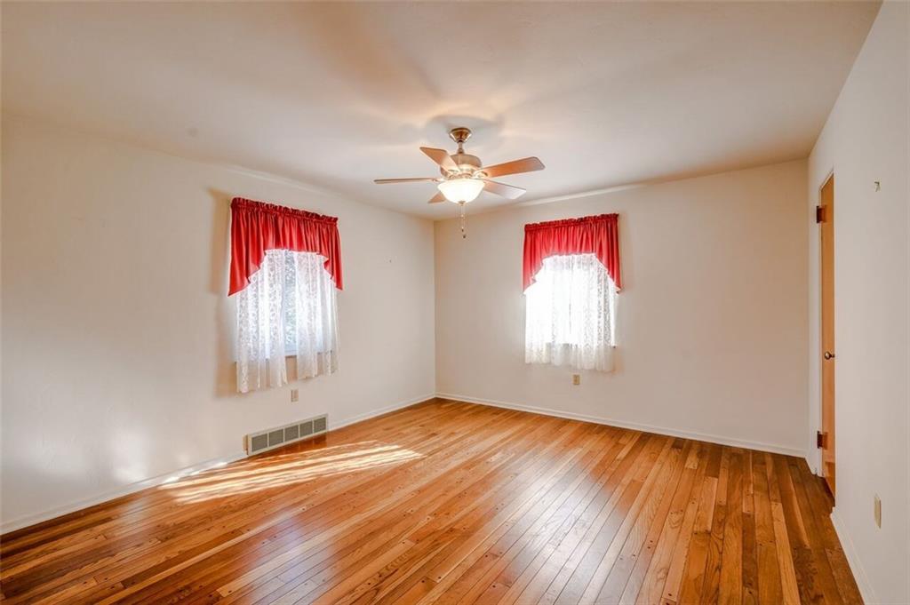 210 Crestmont Road Pittsburgh, PA 15237 - Photo 10 of 24 Hardwood floors also adorn the master bedroom.