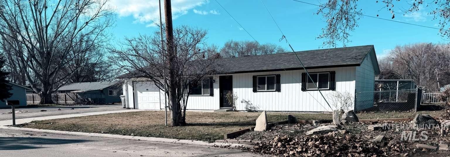 211 Jasper Avenue Middleton, ID 83644 - Photo 2 of 25 Ranch-style house featuring a garage, roof with shingles, and concrete driveway
