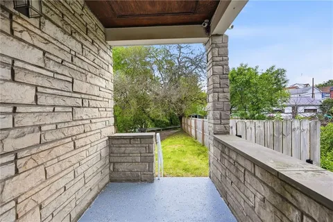 a balcony with an outdoor space