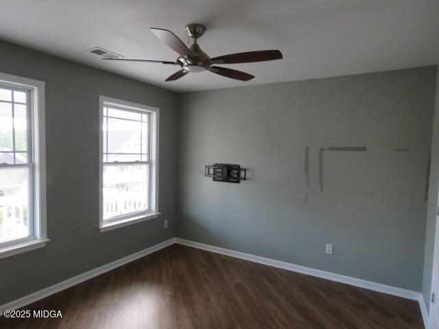 776 Ivy Brook Way Macon, GA 31210 - Photo 11 of 21 a view of an empty room with wooden floor and a window
