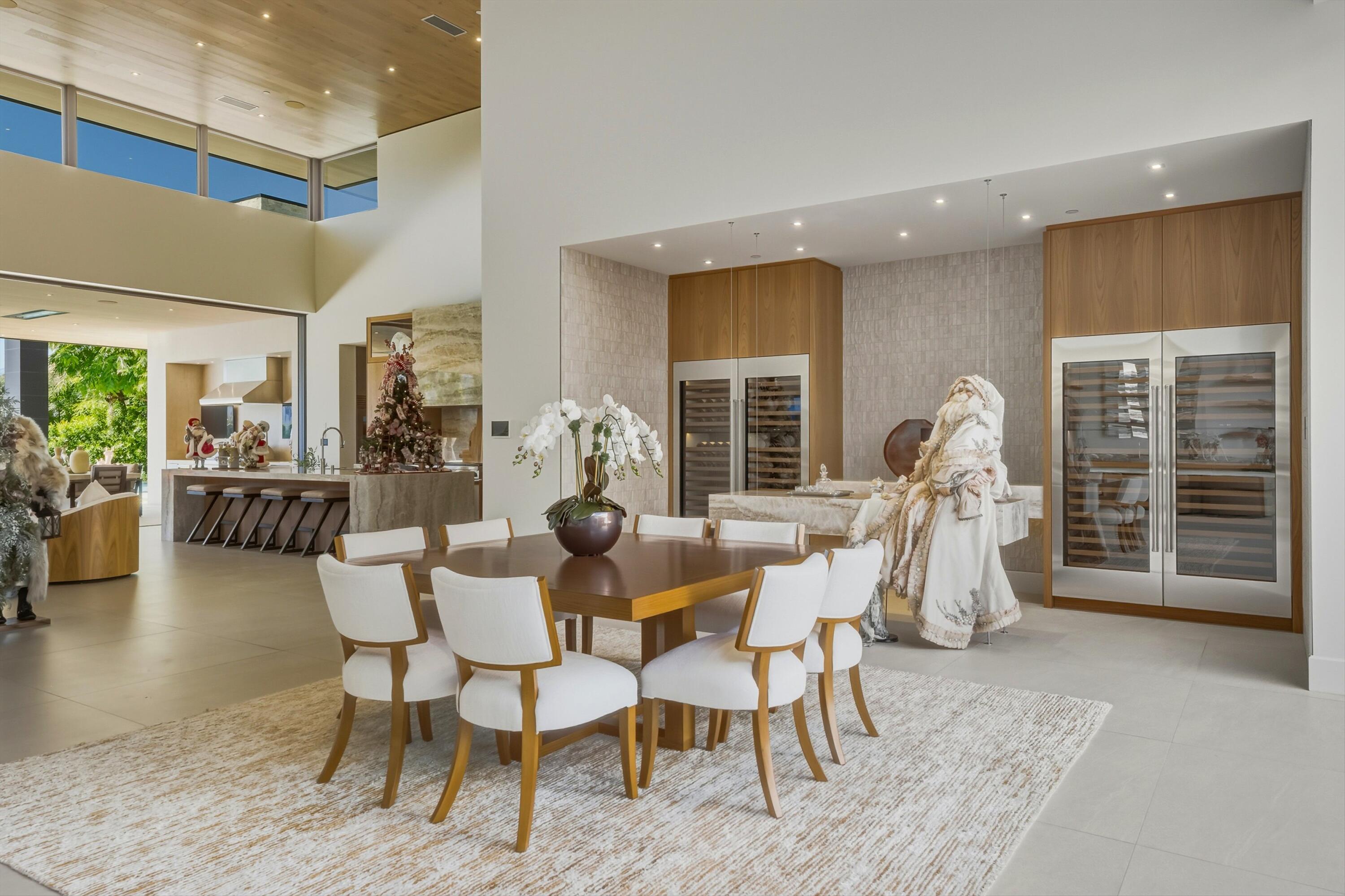 52637 Meriwether Way La Quinta, CA 92253 - Photo 4 of 15 a dining room with furniture and a floor to ceiling window
