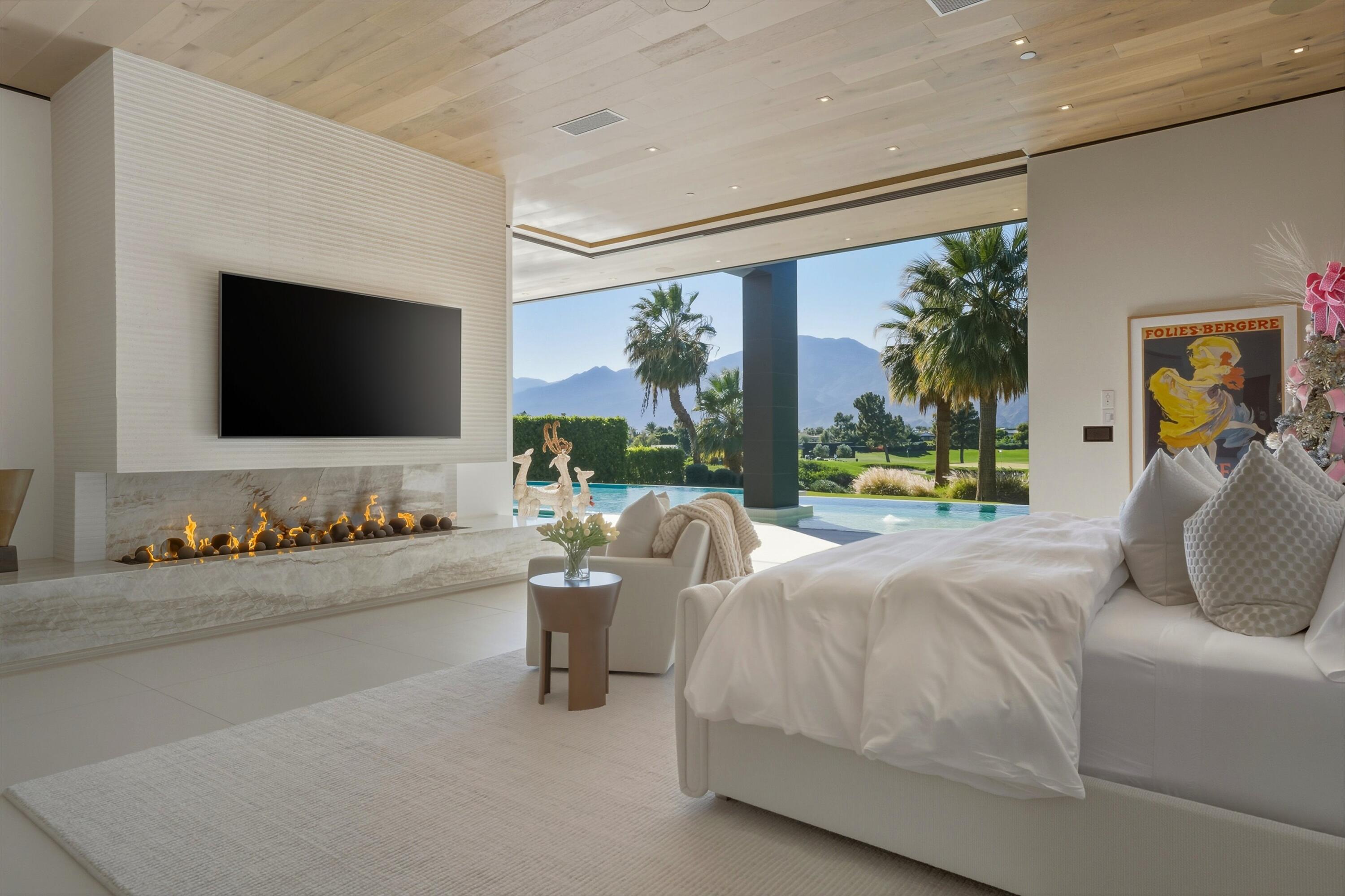 52637 Meriwether Way La Quinta, CA 92253 - Photo 6 of 15 a bedroom with furniture and a flat screen tv