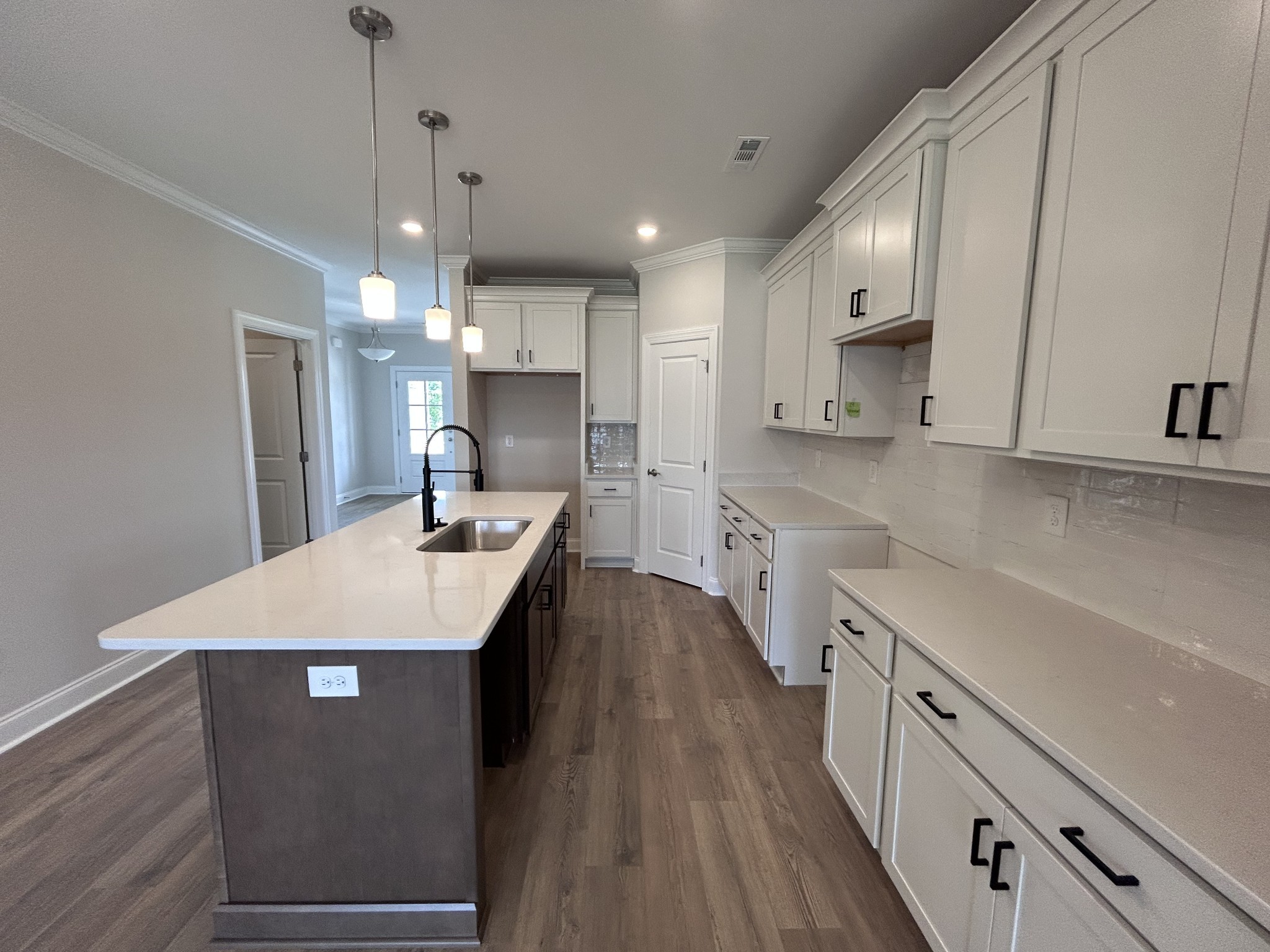 6502 Ripple Ridge Columbia, TN 38401 - Photo 9 of 52 a kitchen with counter top space a sink stainless steel appliances and cabinets