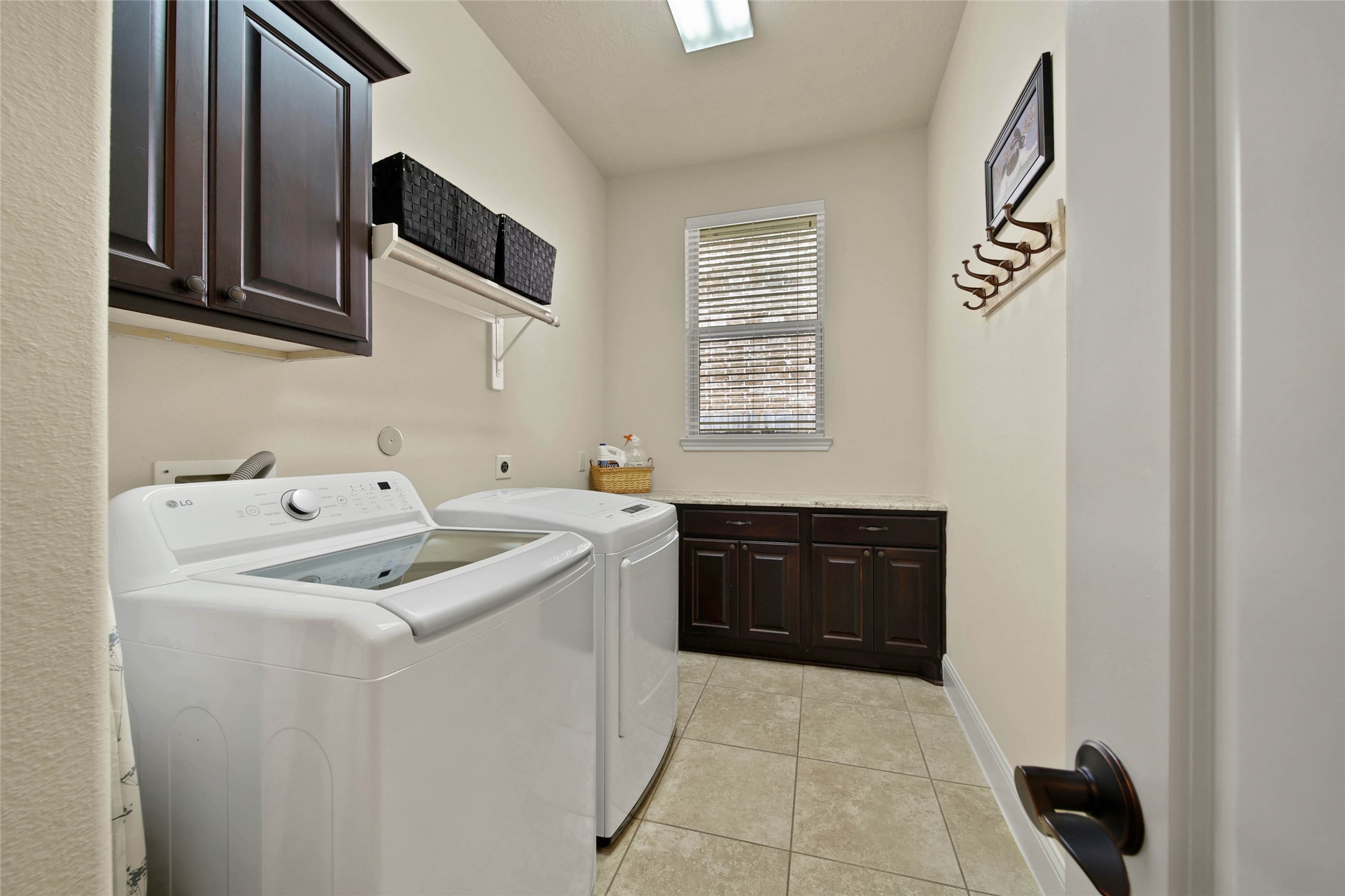3234 Explorer Way Conroe, TX 77301 - Photo 46 of 46 Exceptional utility room features extensive cabinetry and generous counter space.