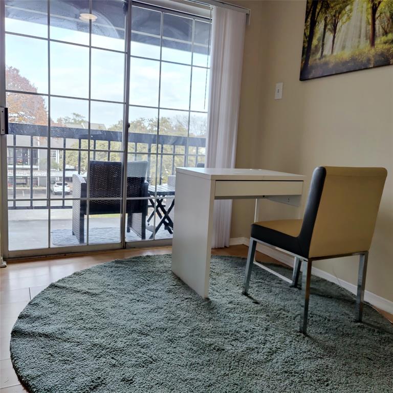 18333 Roehampton Drive Dallas, TX 75252 - Photo 5 of 10 a view of a livingroom with furniture and a window