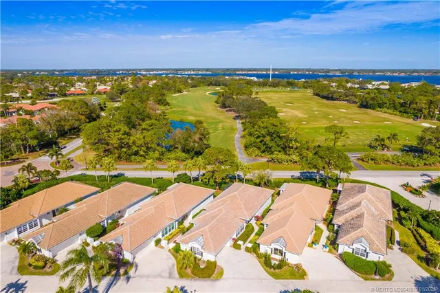 a view of a swimming pool with a balcony