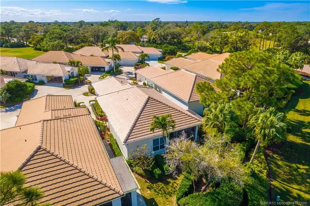 an aerial view of a house with a garden