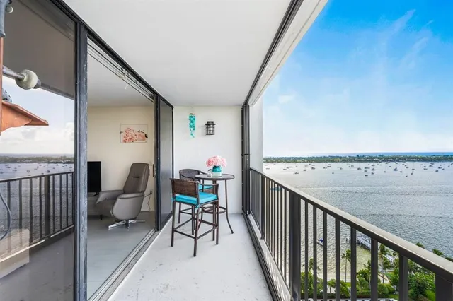 a view of balcony with furniture