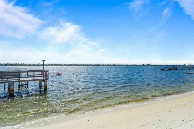 a view of a swimming pool and an outdoor space
