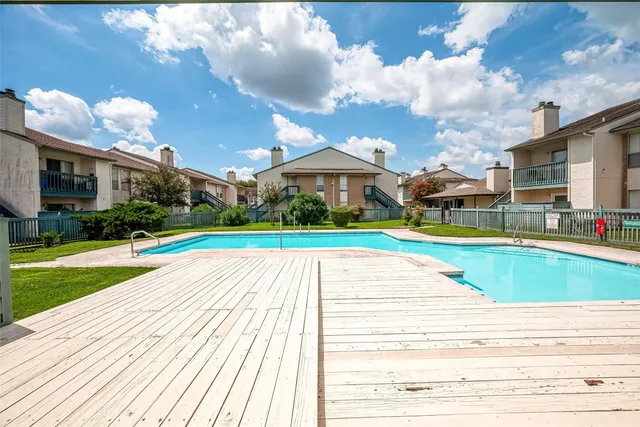 a view of outdoor space yard and swimming pool