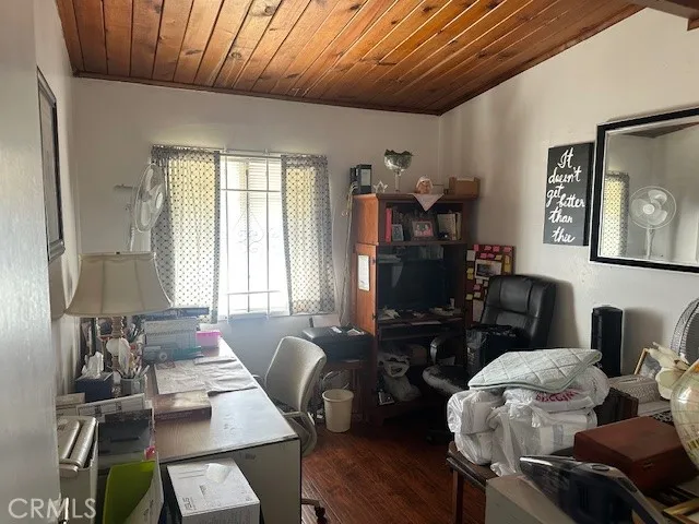 a living room with furniture rug and window