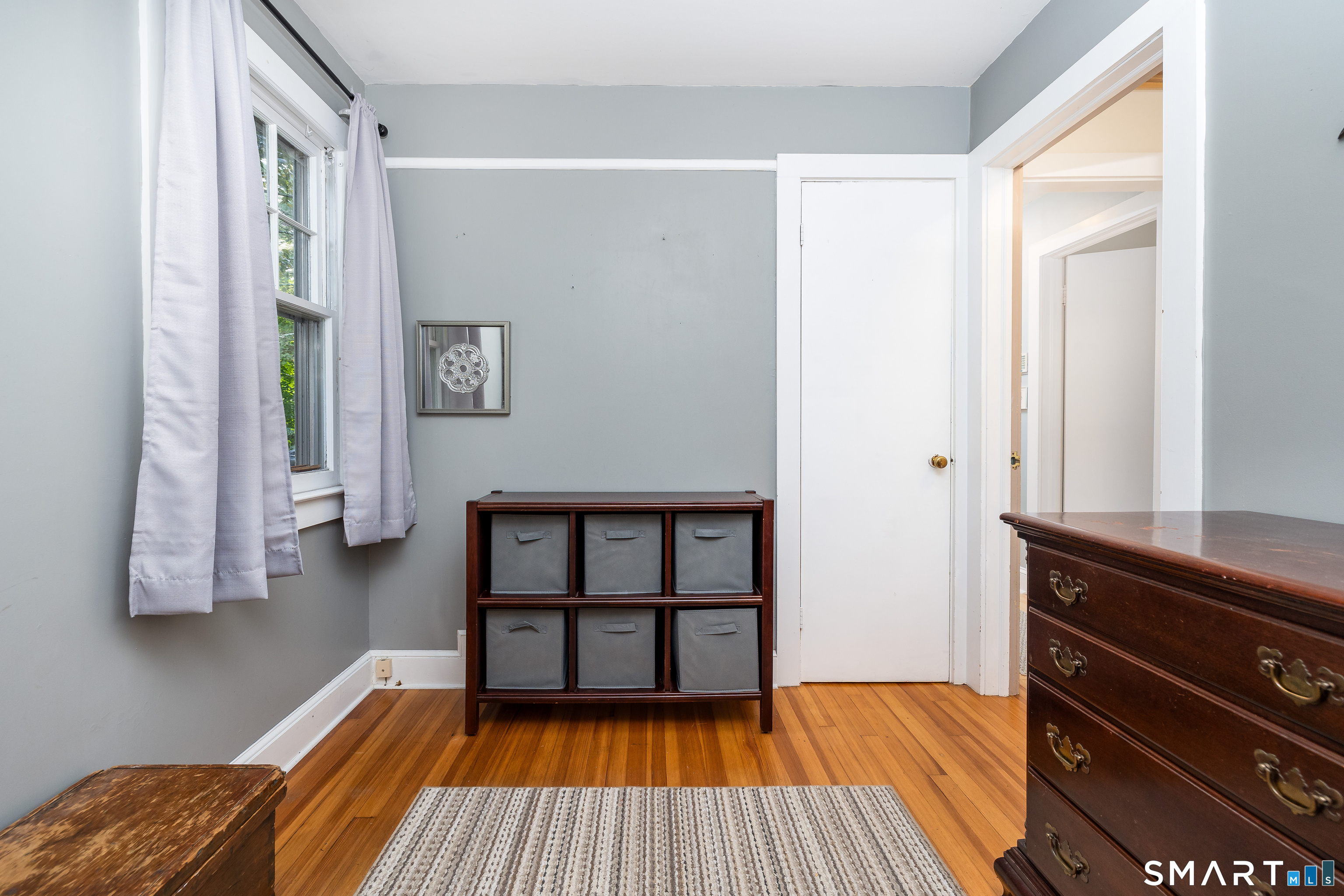 256 Baldwin Hill Road Washington, CT 06777 - Photo 19 of 22 a view of bedroom with wooden floor and fan