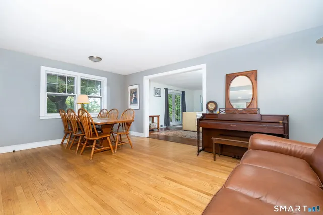 a view of a livingroom with furniture and window
