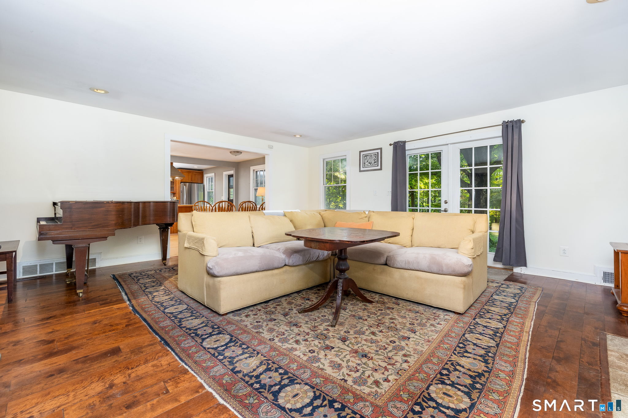 256 Baldwin Hill Road Washington, CT 06777 - Photo 10 of 22 a living room with furniture and a rug