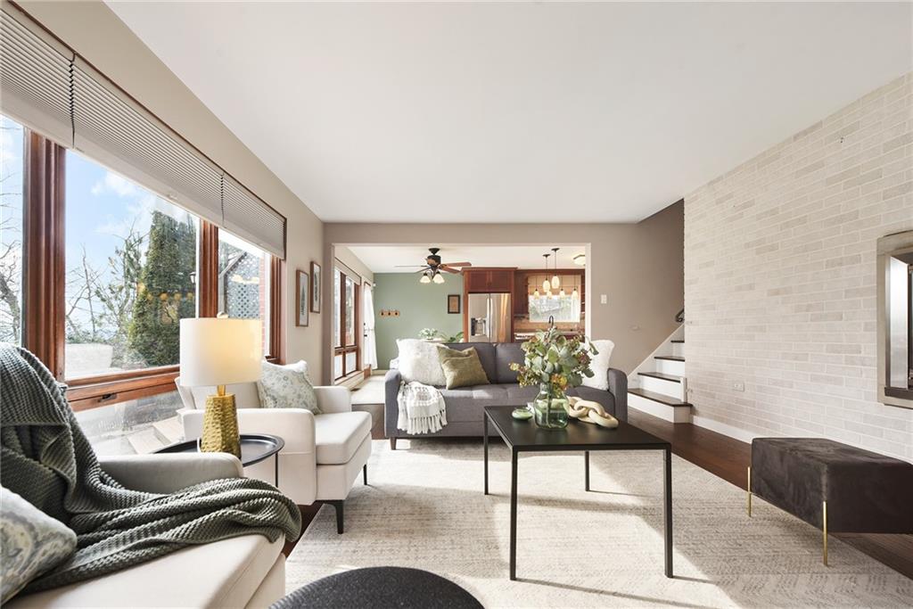 6913 Merton Road Pittsburgh, PA 15202 - Photo 11 of 48 a living room with furniture and a large window