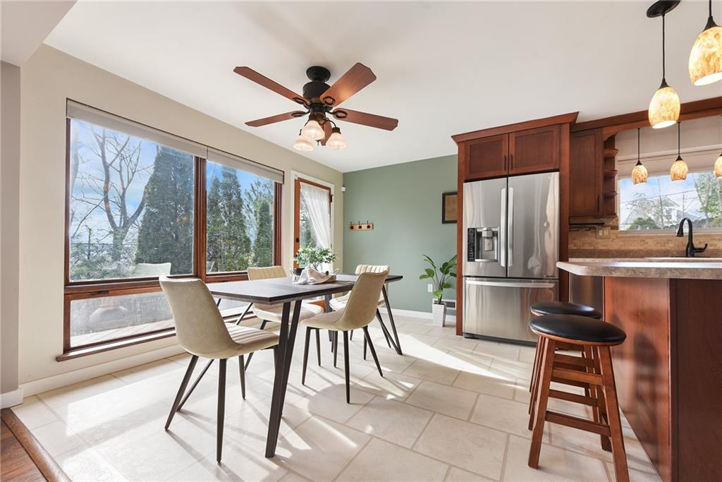 6913 Merton Road Pittsburgh, PA 15202 - Photo 13 of 48 a view of a dining room with furniture window and outside view