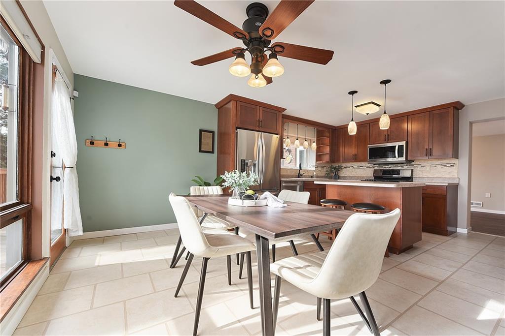 6913 Merton Road Pittsburgh, PA 15202 - Photo 16 of 48 a view of a dining room with furniture