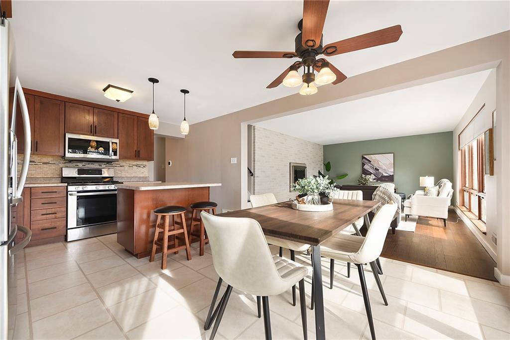 6913 Merton Road Pittsburgh, PA 15202 - Photo 17 of 48 a view of kitchen with refrigerator stove and microwave
