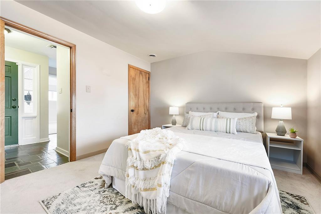 6913 Merton Road Pittsburgh, PA 15202 - Photo 30 of 48 a large white bed in a white room