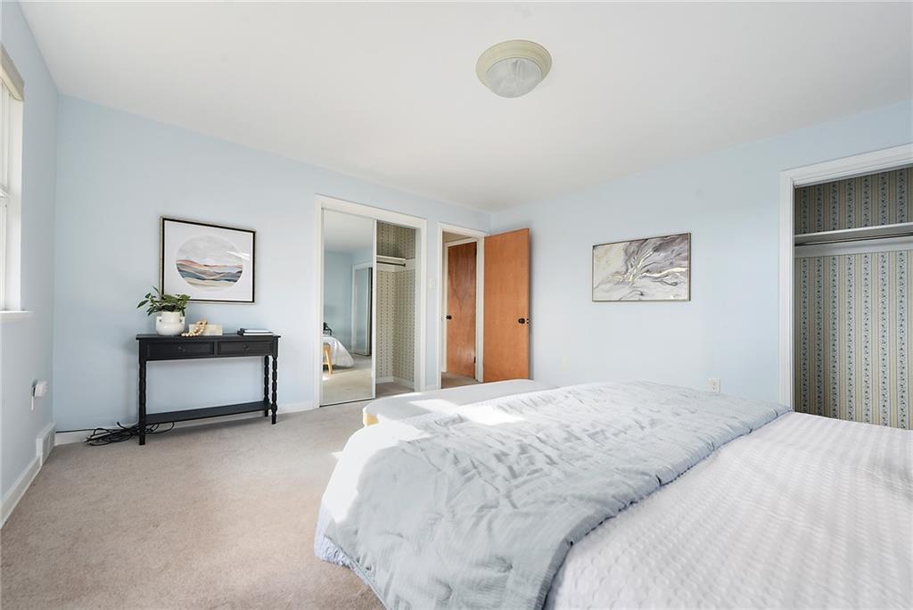 6913 Merton Road Pittsburgh, PA 15202 - Photo 35 of 48 a bedroom with a bed and a table in it