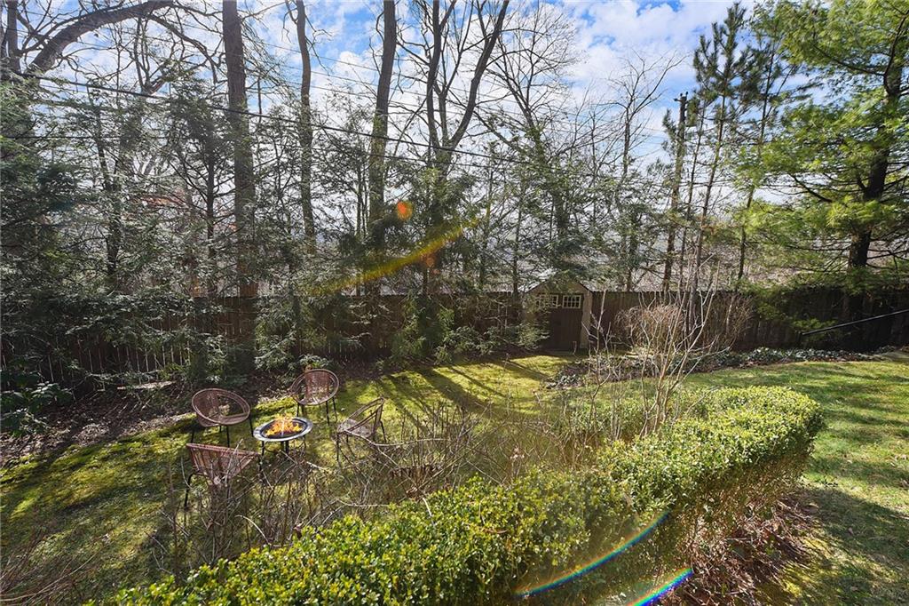 6913 Merton Road Pittsburgh, PA 15202 - Photo 43 of 48 a backyard of a house with a yard and outdoor seating