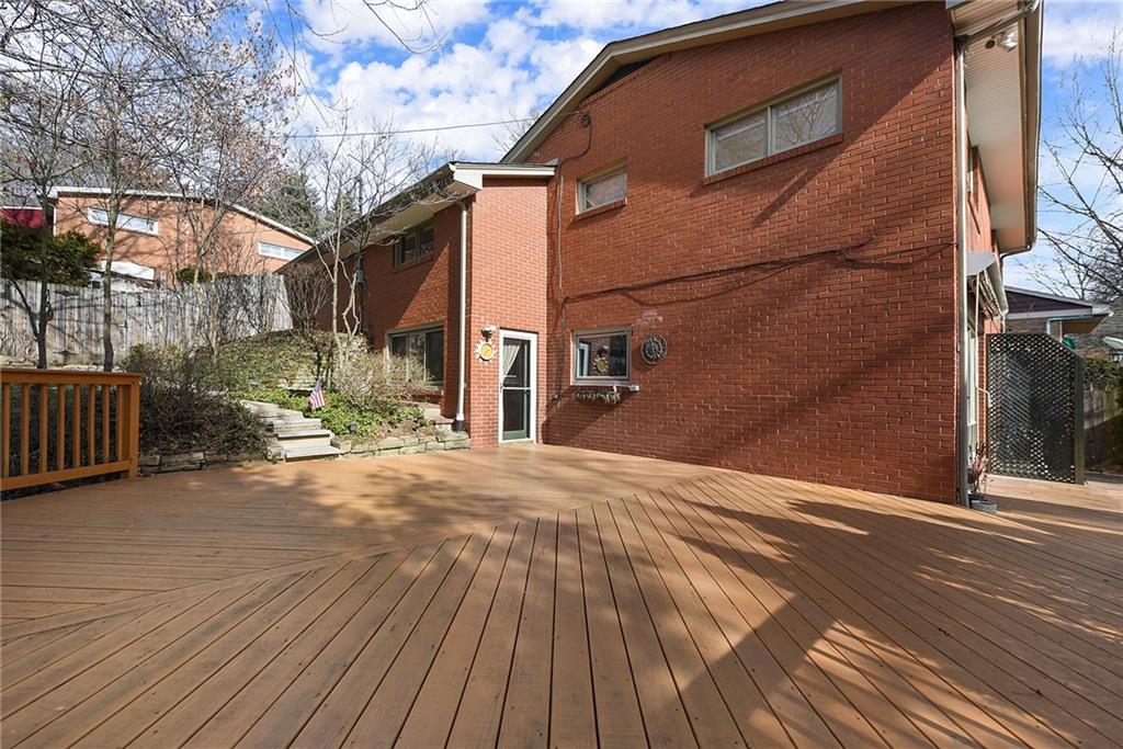 6913 Merton Road Pittsburgh, PA 15202 - Photo 46 of 48 a view of a house with a wooden fence