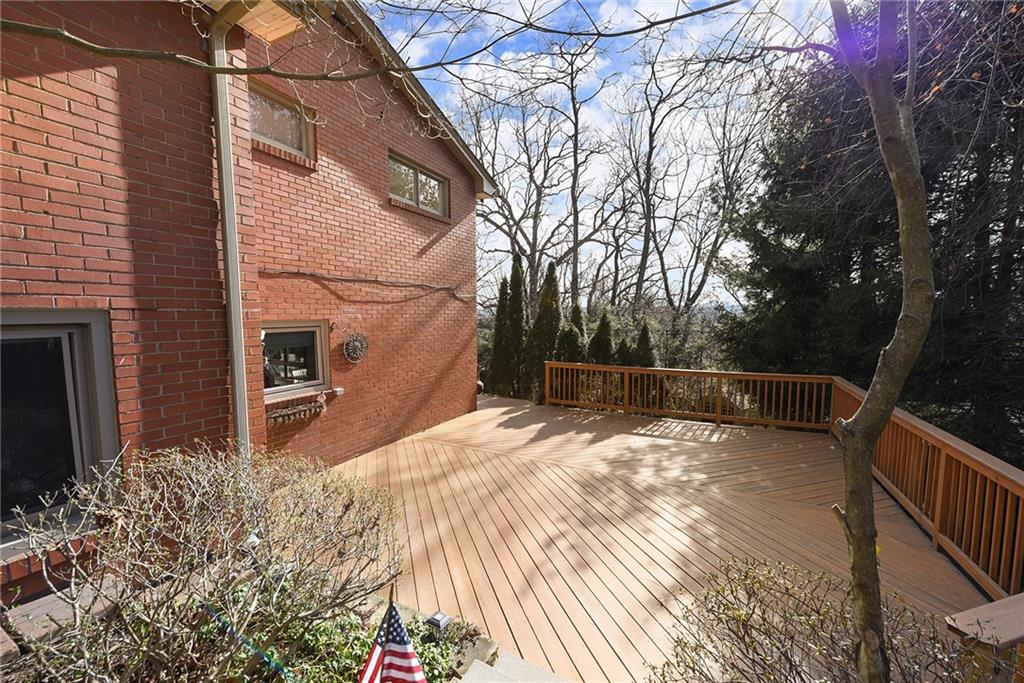 6913 Merton Road Pittsburgh, PA 15202 - Photo 47 of 48 a view of backyard with wooden fence and large trees