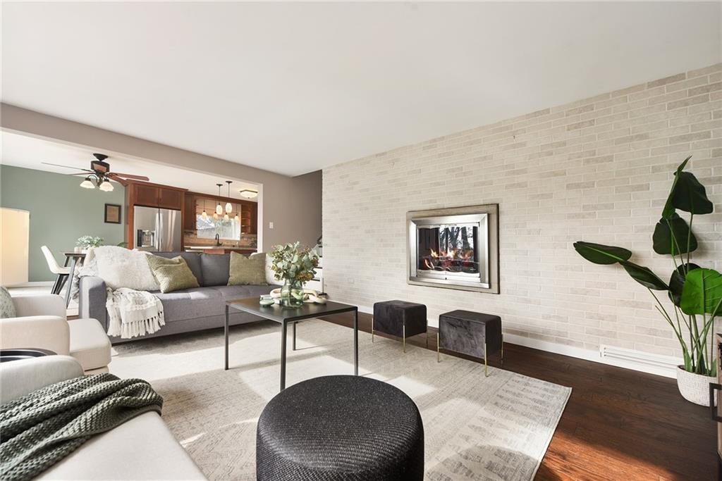 6913 Merton Road Pittsburgh, PA 15202 - Photo 10 of 48 a living room with furniture and a wooden floor