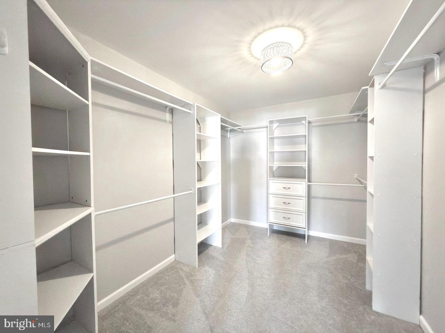 83 Ripley Road Stafford, VA 22556 - Photo 12 of 41 Spacious, organized closet with modern design.