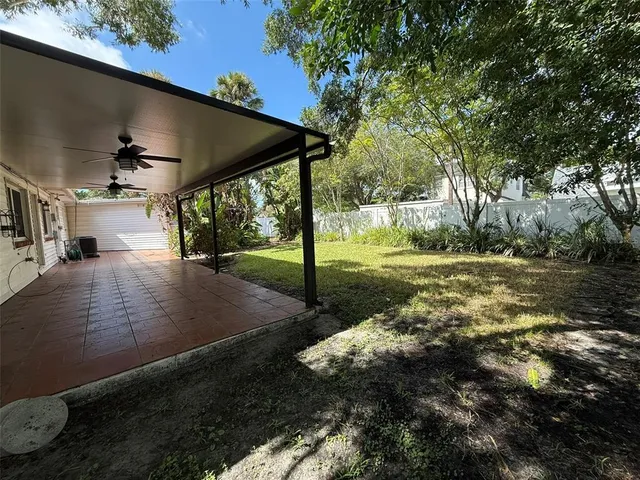 a view of a yard with plants