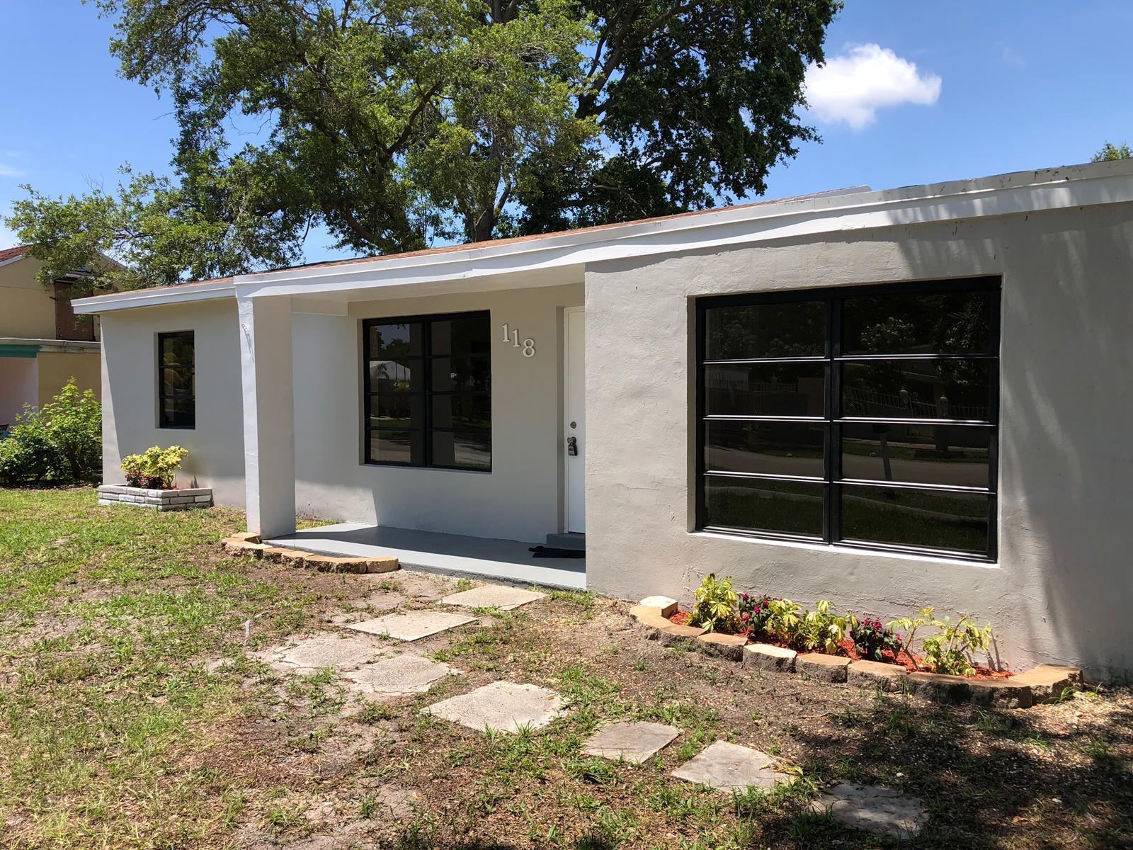 118 Ronald Road West Park, FL 33023 - Photo 3 of 15 Side View