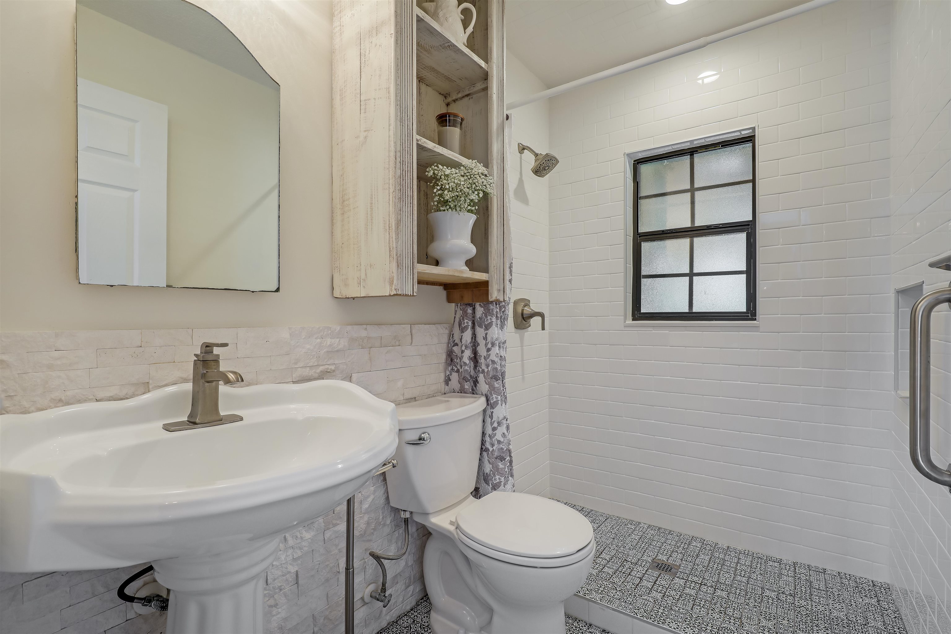 4485 Highway 16 St. Augustine, FL 32092 - Photo 35 of 59 a bathroom with a sink toilet and mirror