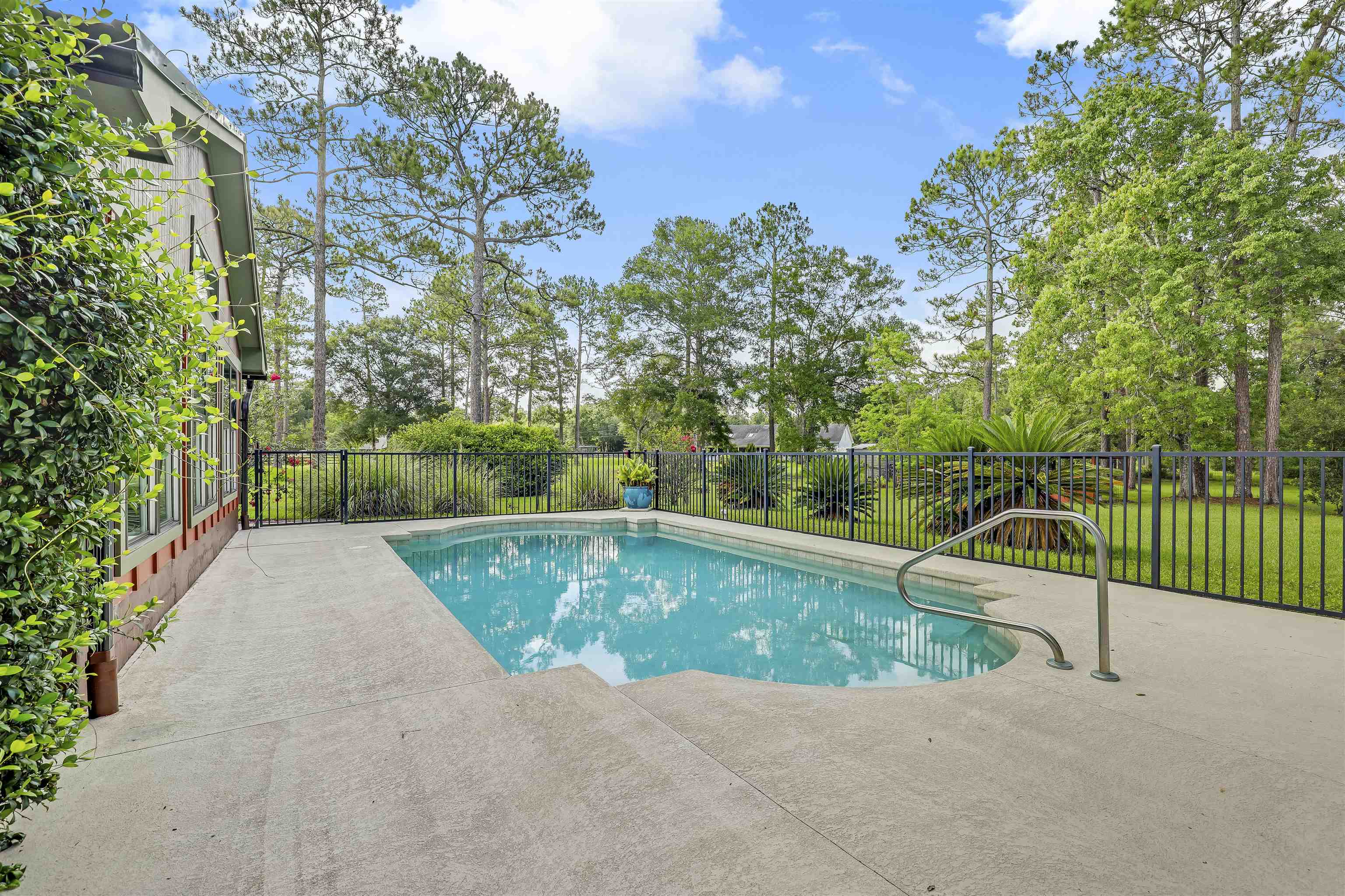 4485 Highway 16 St. Augustine, FL 32092 - Photo 43 of 59 a view of a swimming pool with a backyard