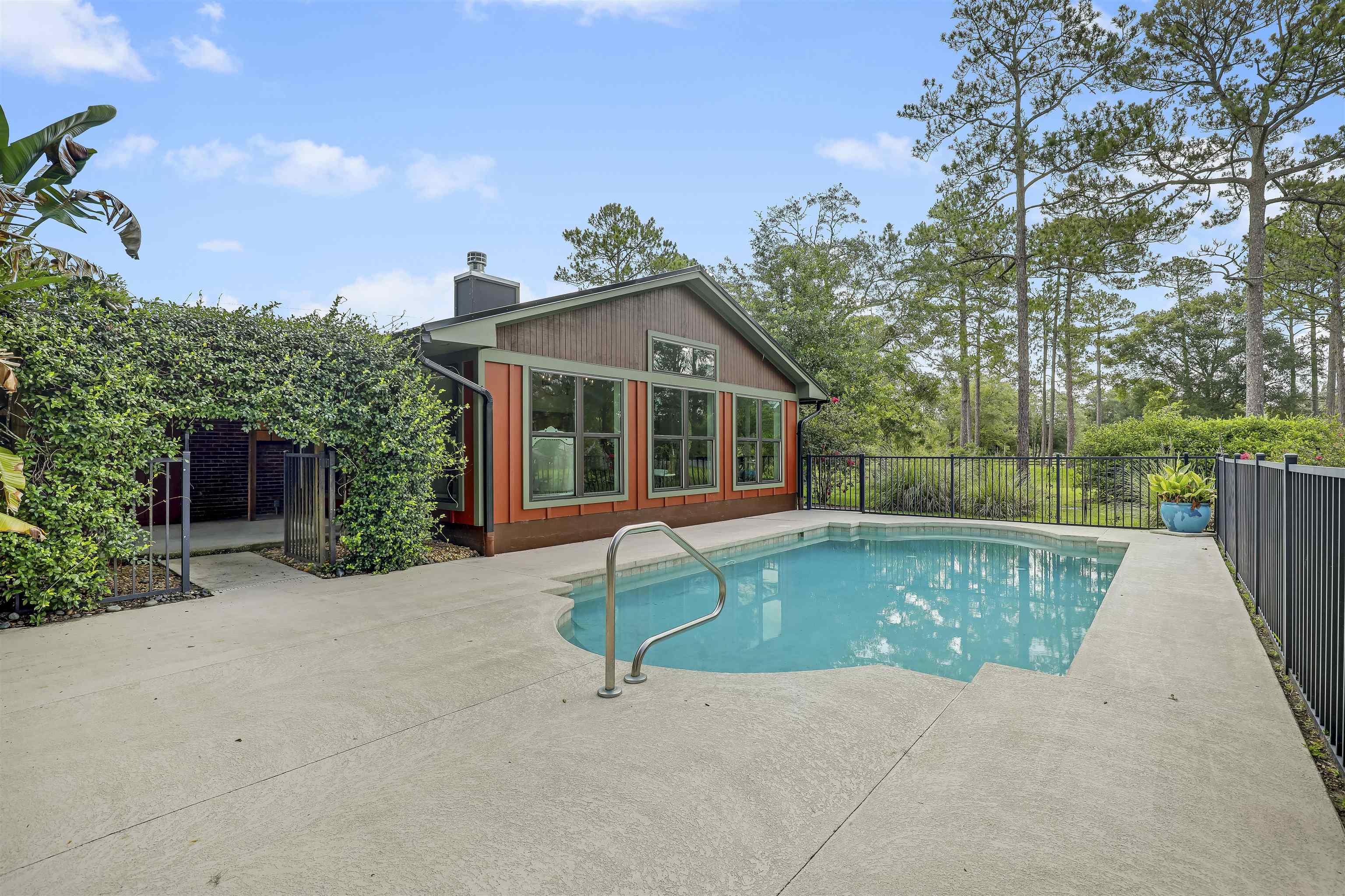 4485 Highway 16 St. Augustine, FL 32092 - Photo 44 of 59 a view of a house with pool in front of it