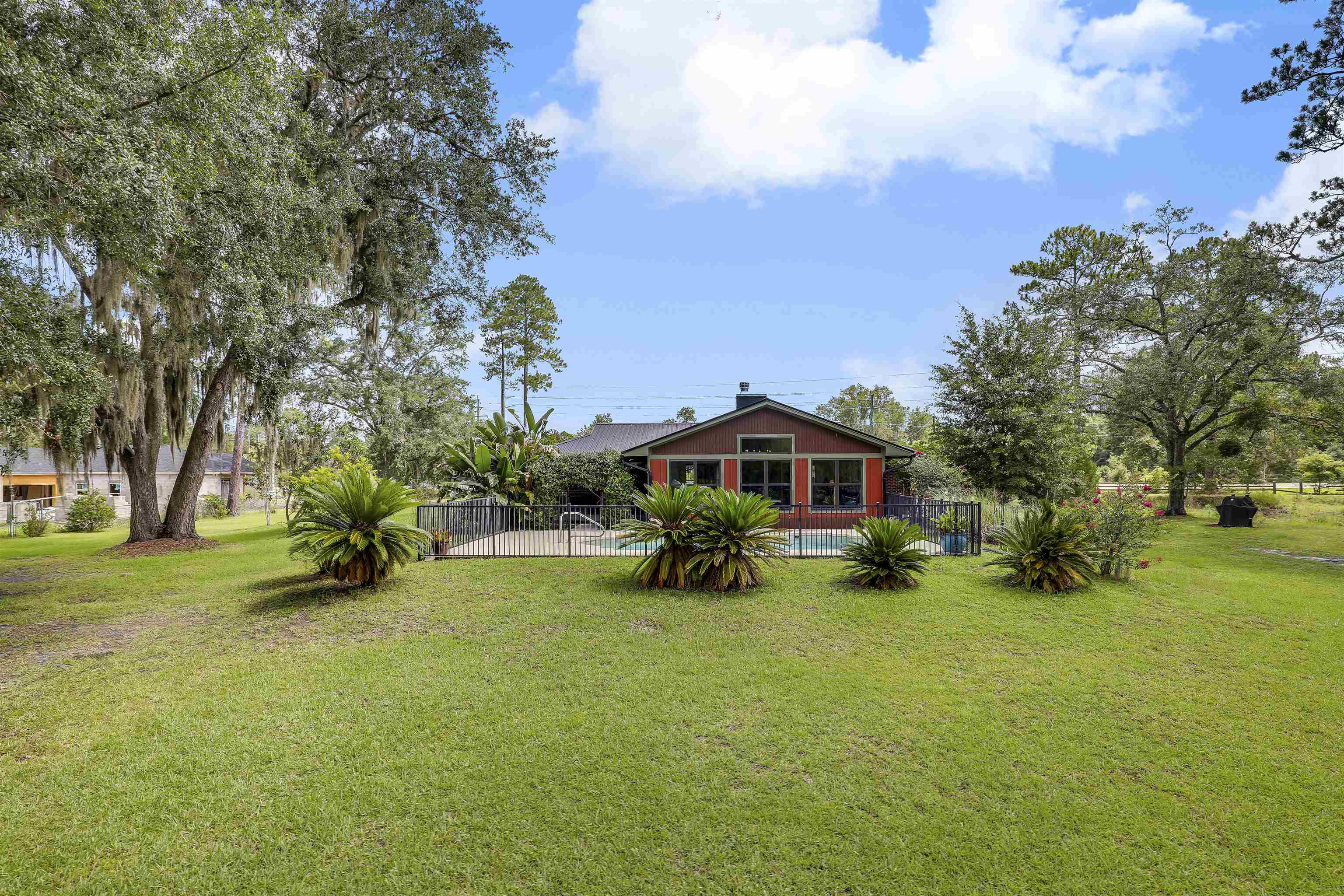 4485 Highway 16 St. Augustine, FL 32092 - Photo 49 of 59 a view of a house with a yard