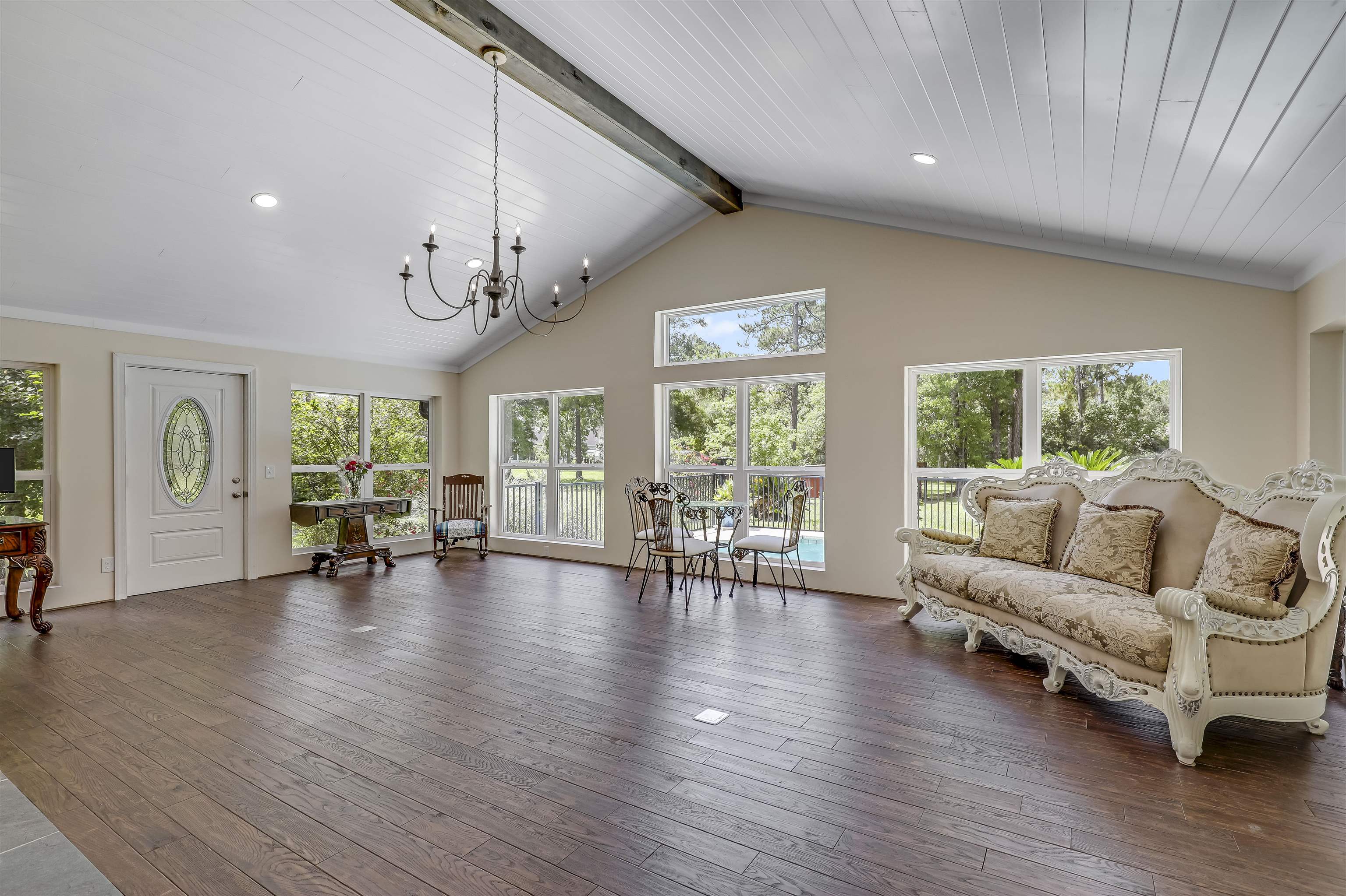 4485 Highway 16 St. Augustine, FL 32092 - Photo 7 of 59 a living room with furniture and a large window