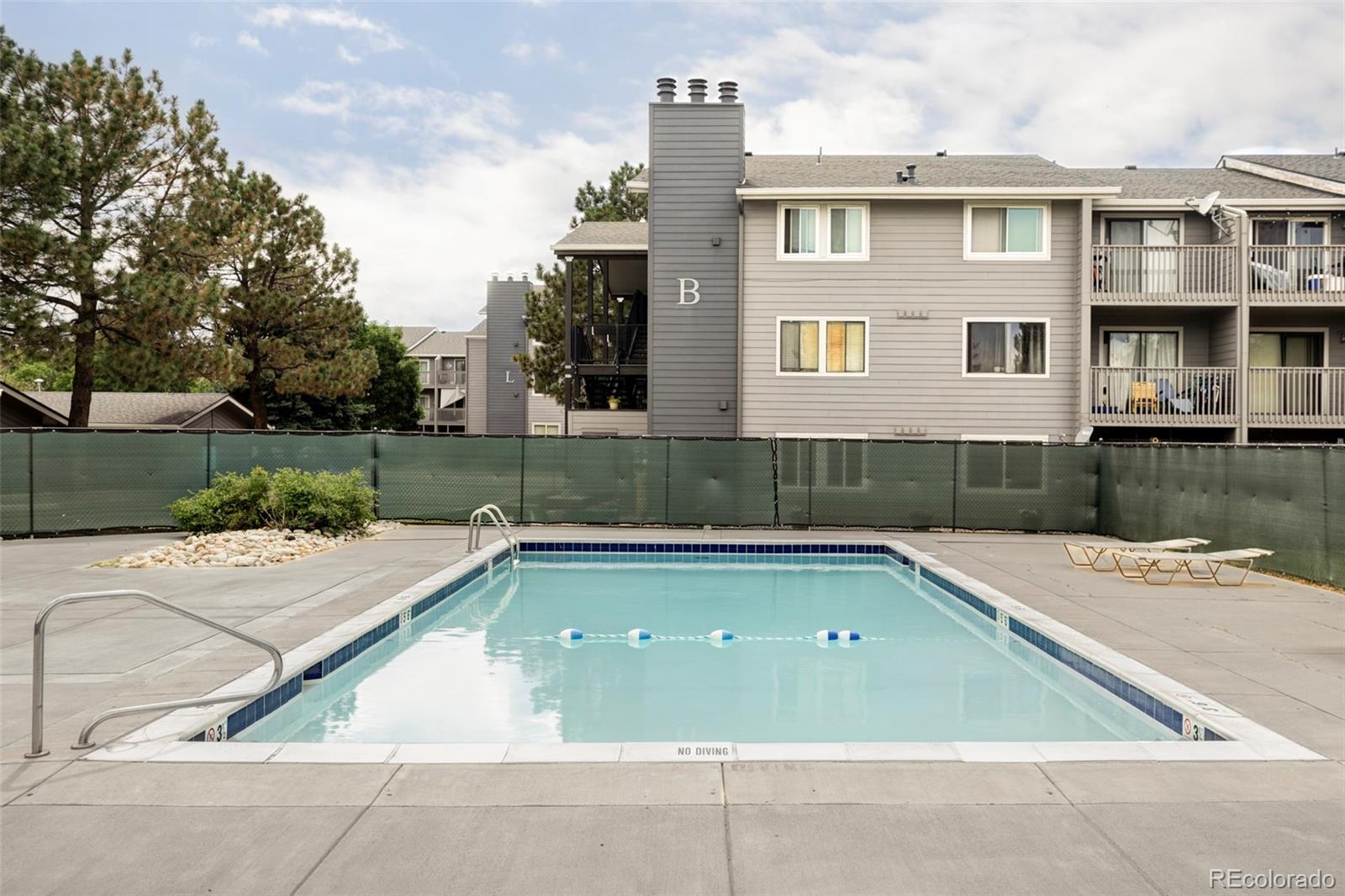 8100 West Quincy Avenue, Unit K3 Littleton, CO 80123 - Photo 19 of 19 a view of a house with pool table and chairs