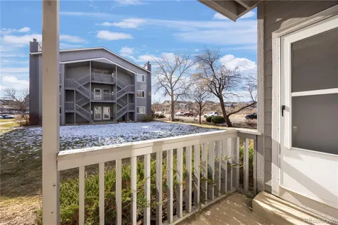a view of a porch with a yard
