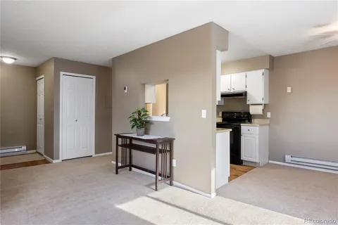 a view of kitchen and living room