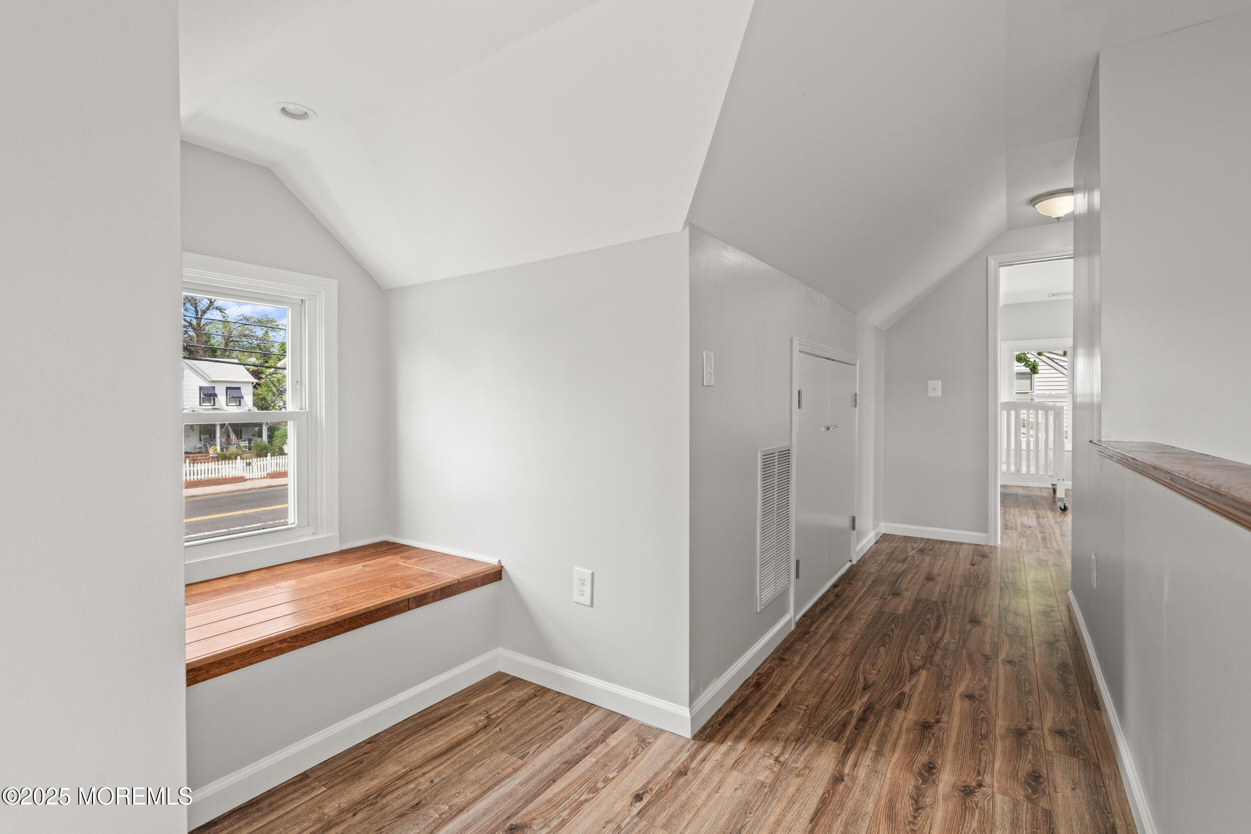 324 Cedar Avenue Elberon, NJ 07740 - Photo 20 of 25 a view of livingroom with hardwood floor and hallway