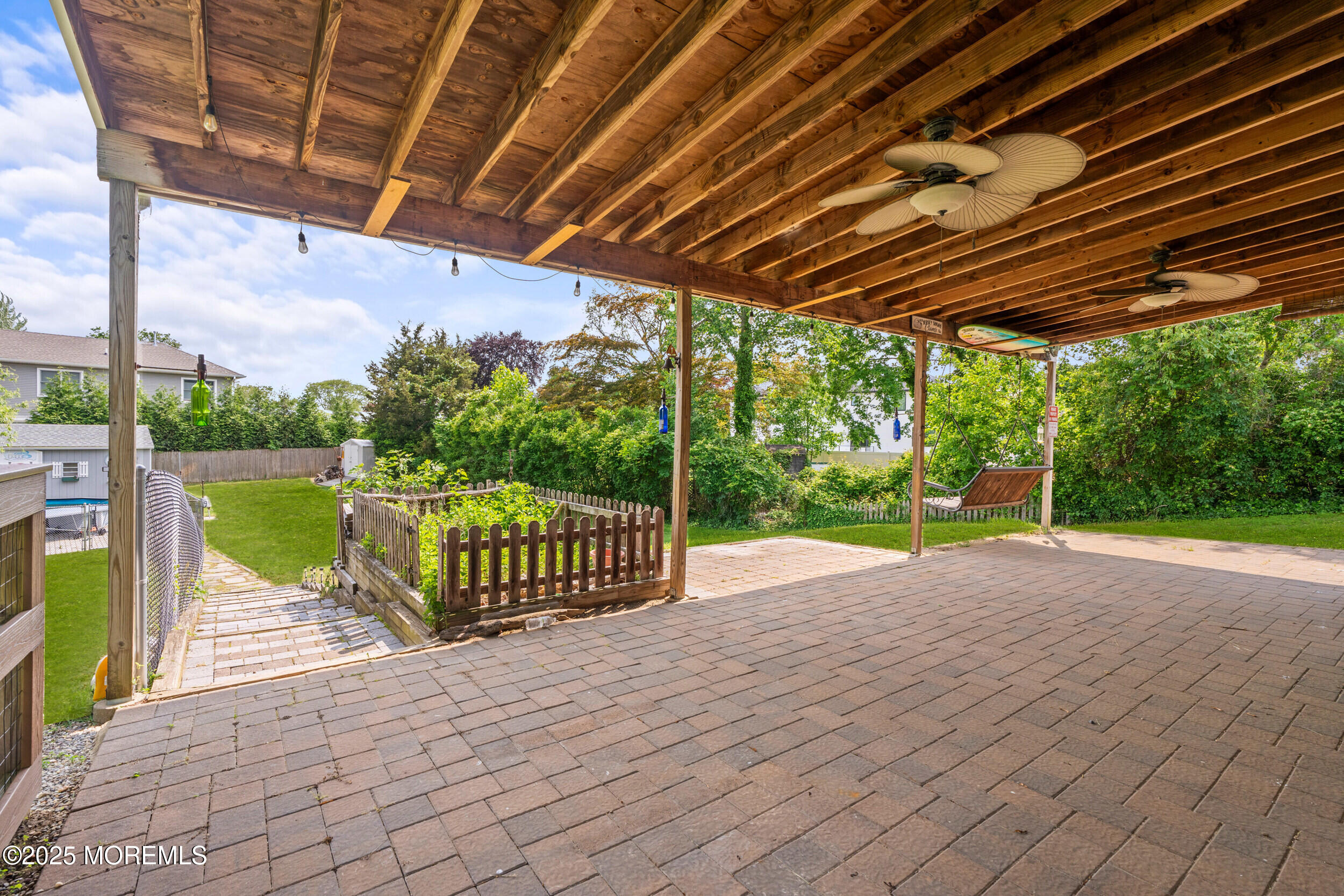 324 Cedar Avenue Elberon, NJ 07740 - Photo 2 of 25 a view of patio with wooden floor