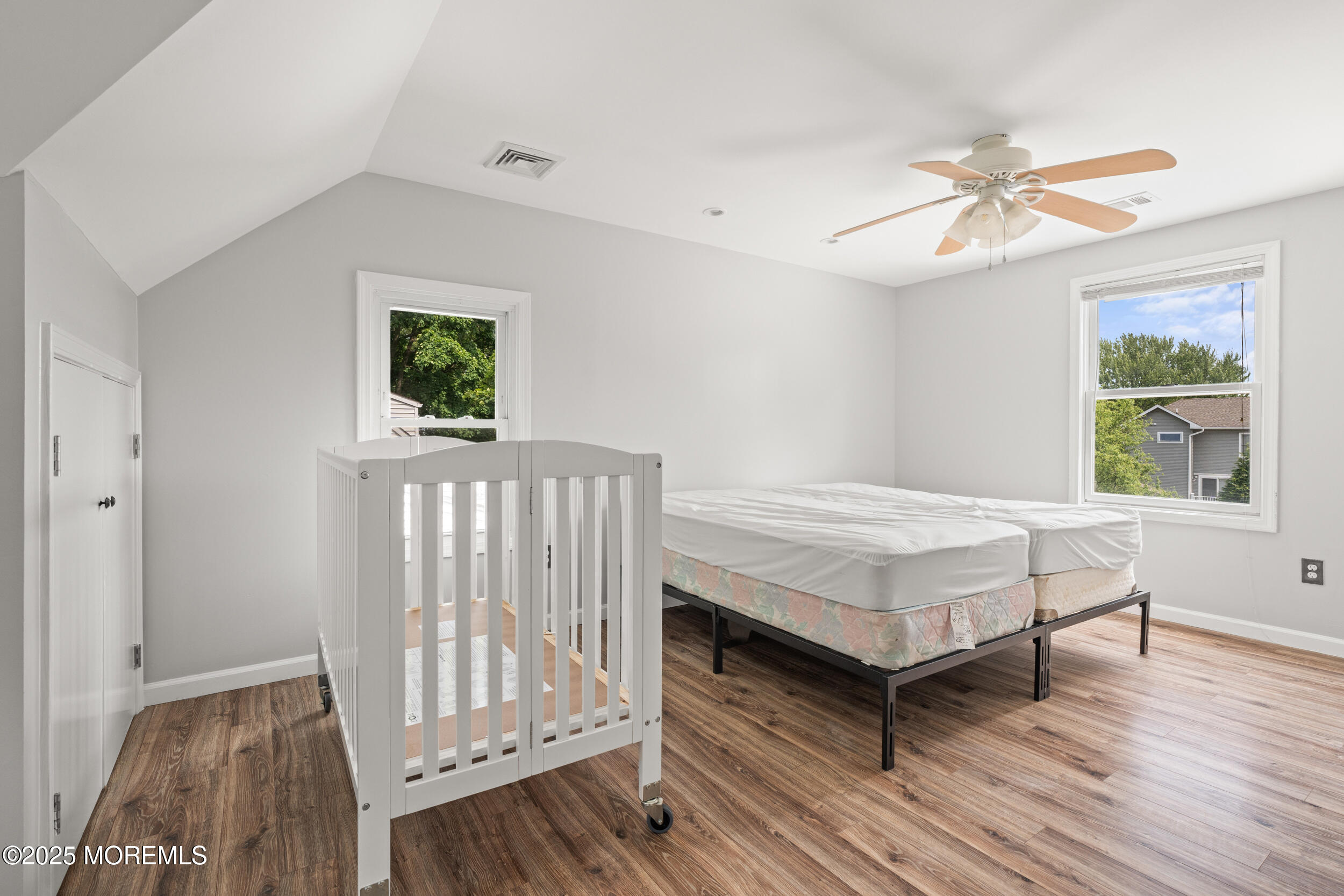 324 Cedar Avenue Elberon, NJ 07740 - Photo 21 of 25 a bedroom with a bed and a window