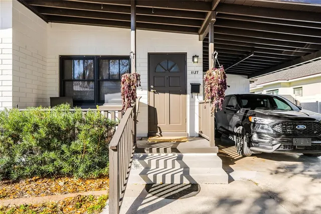 a view of front door and porch