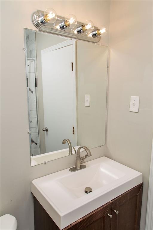 1681 Atherton Circle Decatur, GA 30035 - Photo 16 of 17 a bathroom with a sink and a mirror
