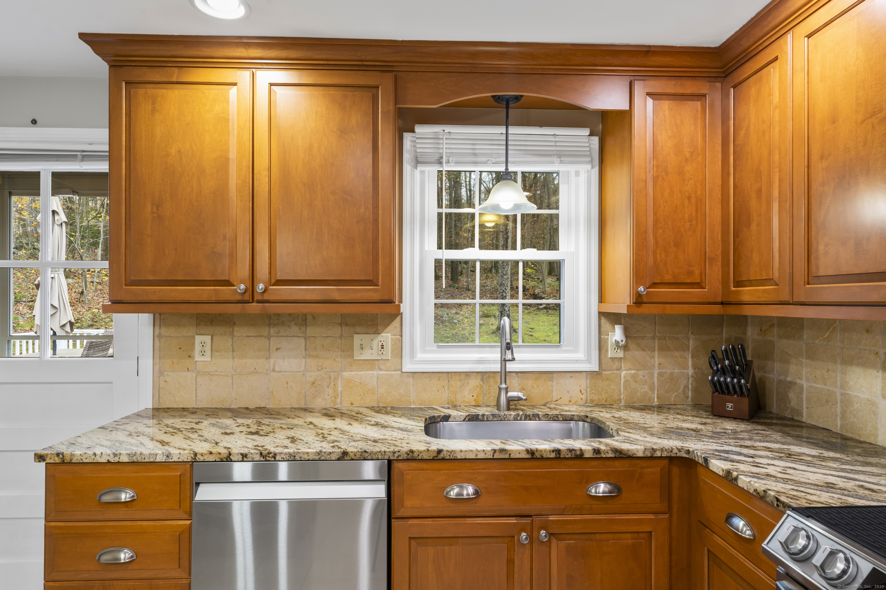 8 Possum Ridge Road Newtown, CT 06470 - Photo 17 of 38 a kitchen with granite countertop cabinets stainless steel appliances and a sink