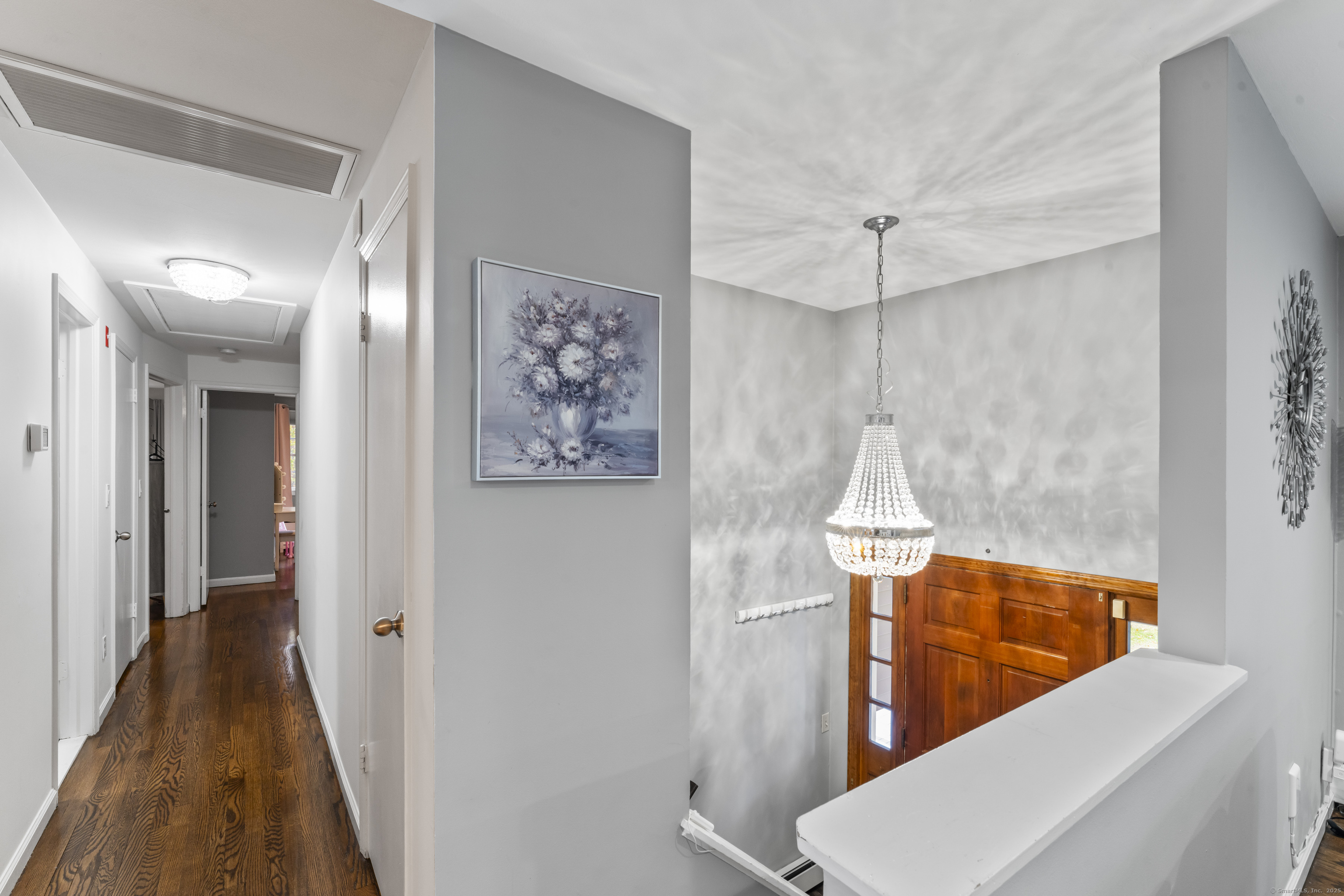 8 Possum Ridge Road Newtown, CT 06470 - Photo 18 of 38 a view of a hallway with seating area